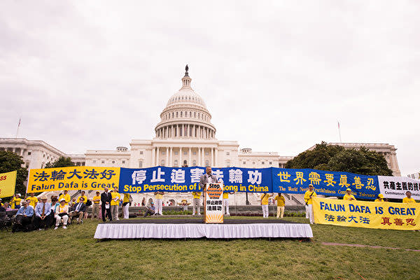 6月20日、世界各国から集まった法輪功学習者らが米ワシントンDCのキャピトルヒルで、中国当局による迫害に抗議する集会を行った（戴兵/大紀元）