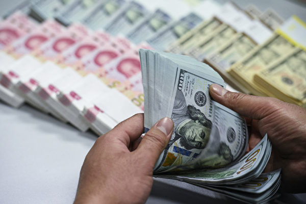 中国人民銀行は5営業日連続、対ドルの人民元基準値を1ド＝7元台に設定した（大紀元資料室）