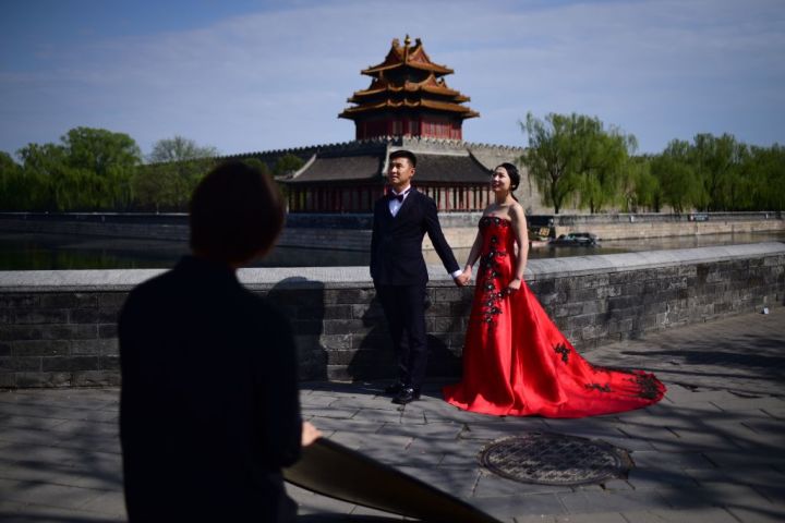 中国では結婚を望まない若者が増えていることが最近の調査で分かった（WANG ZHAO/AFP/Getty Images）