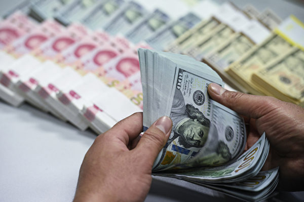 香港紙によると、今年に入って以来、中国企業のドル建て債のデフォルト規模は昨年の3倍の120億ドルに達した（大紀元資料室）