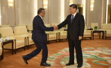 2020年1月28日、WHOのテドロス事務局長（左）が中国を訪問し、北京で習近平国家主席（右）と会談した（Getty Images）