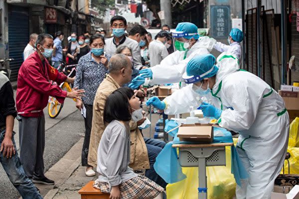 武漢市政府は5月12日からの10日間内に全市民を対象に核酸増幅検査（NAT）を実施する（Photo by STR/AFP via Getty Images）