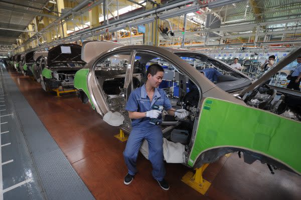 中国の自動車生産工場（PETER PARKS/AFP）