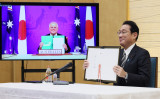 日豪円滑化協定に署名した岸田首相と豪モリソン首相（写真提供：内閣広報室）