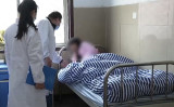 中国国営中央テレビ（CCTV）は2月10日、現在精神病院に入院している徐州市豊県の「子ども8人の母」に関して報道した（スクリーンショット）