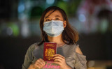 イギリス海外市民ビザを持つ香港の学生。2020年6月3日撮影 （Photo by ANTHONY WALLACE/AFP via Getty Images）