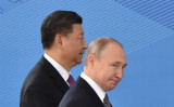 2019年6月14日、キルギスの首都、ビシュケクで開かれた上海協力機構（SCO）首脳理事会に出席した、ロシアのプーチン大統領と中国の習近平国家主席（Vyacheslav Oseledko/AFP via Getty Images）