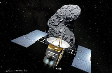 日本の小惑星探査機「はやぶさ」と小惑星のイメージ図（Akihiro IKESHITA/AFP via Getty Images）