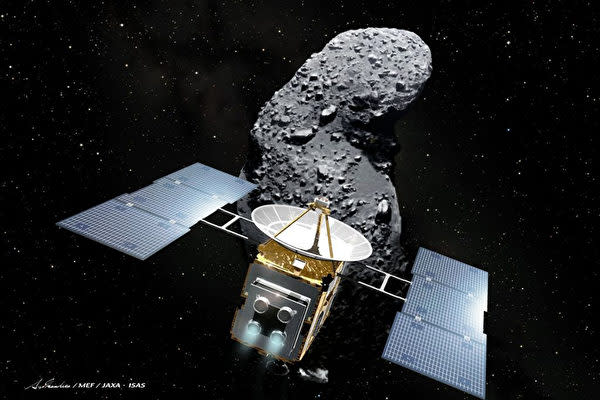 日本の小惑星探査機「はやぶさ」と小惑星のイメージ図（Akihiro IKESHITA/AFP via Getty Images）